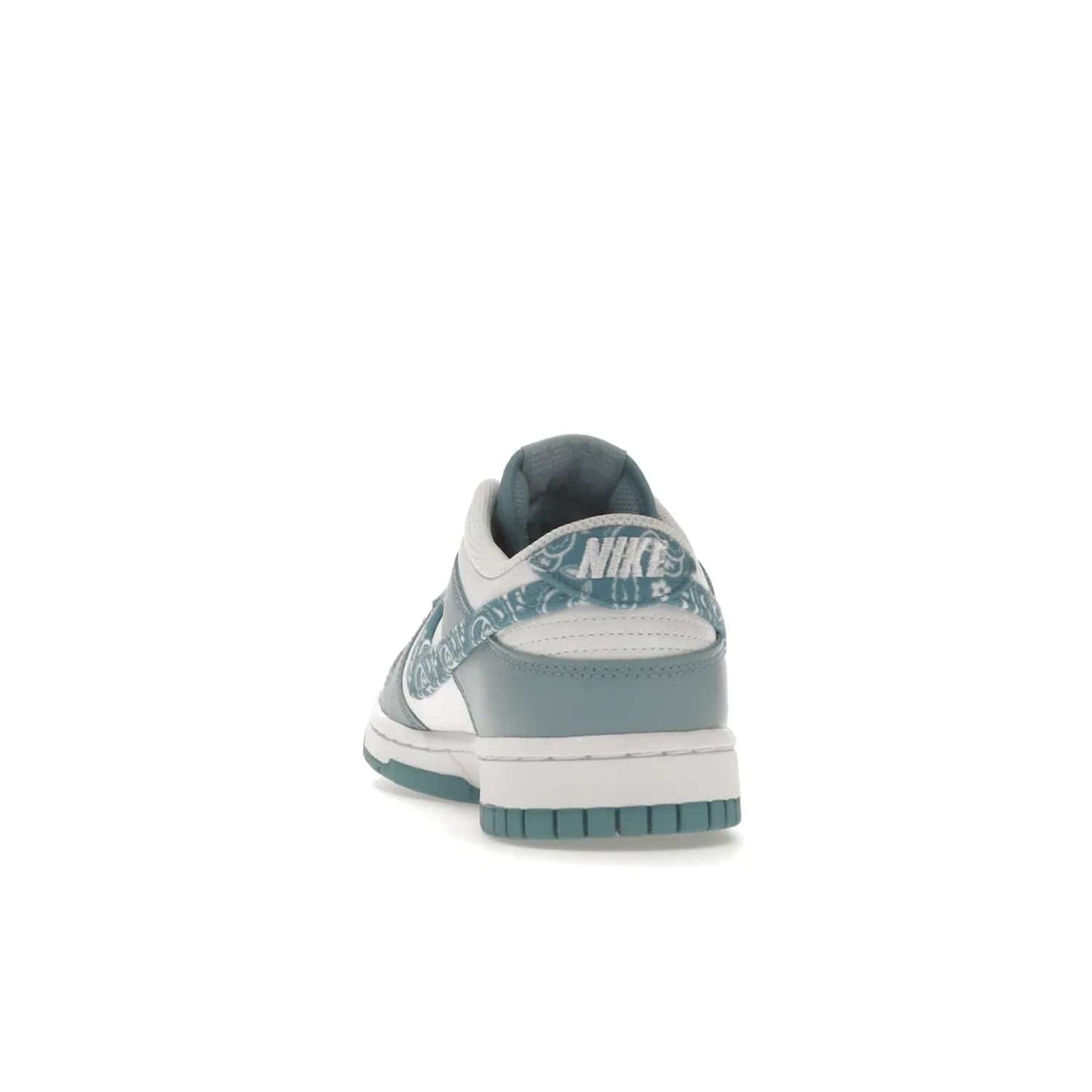 Nike Dunk Low Essential Paisley Pack Worn Blue (Women's) - Image 27 - Only at www.BallersClubKickz.com - Get the Nike Dunk Low Essential Paisley Pack Worn Blue (Women's) for style and comfort. White leather construction, light blue leather overlays, canvas Swooshes and matching heel tabs offer a rich blue hue. Finished by a white and light blue sole, this classic Nike Dunk is the perfect addition to any wardrobe. Released in March 2022.