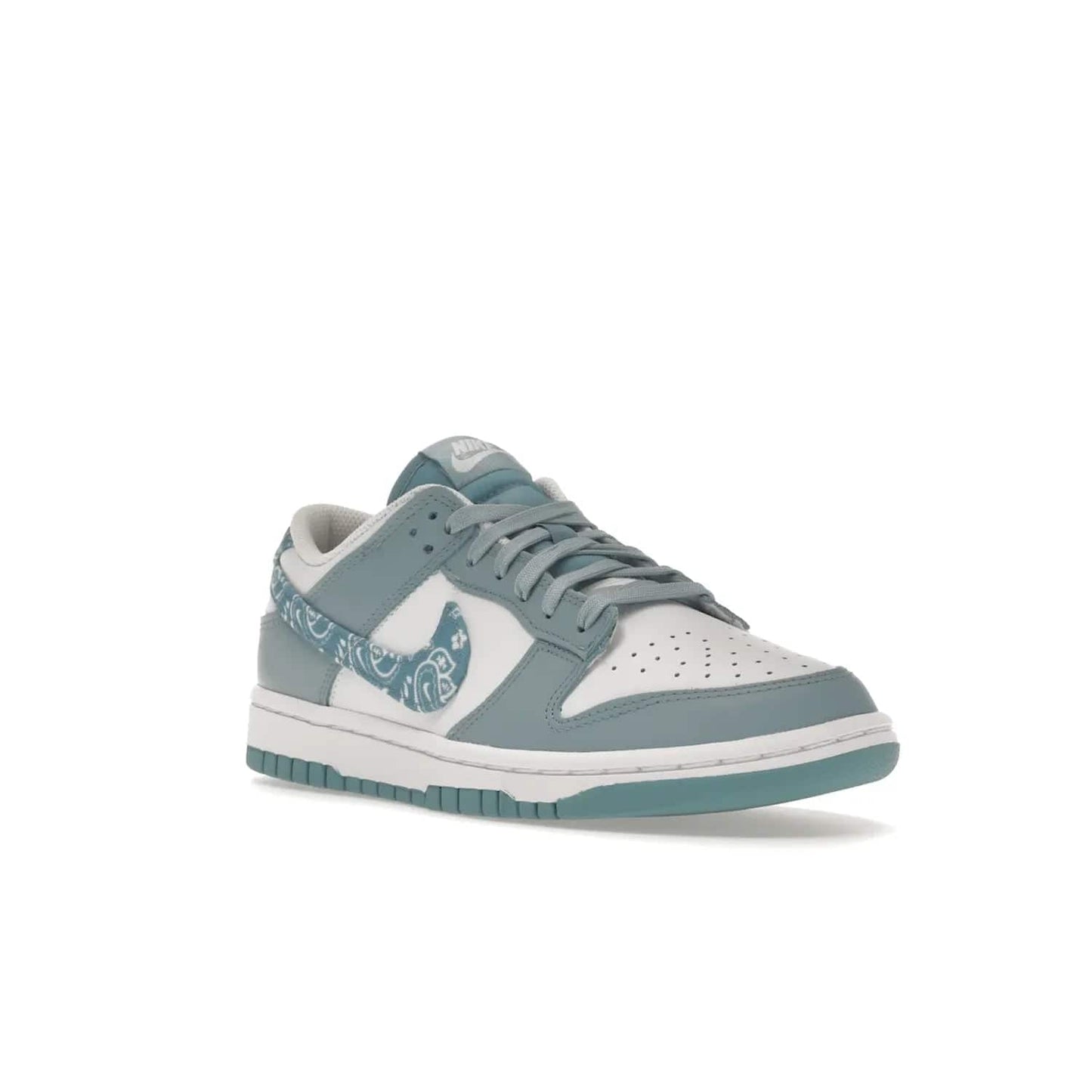 Nike Dunk Low Essential Paisley Pack Worn Blue (Women's) - Image 6 - Only at www.BallersClubKickz.com - Get the Nike Dunk Low Essential Paisley Pack Worn Blue (Women's) for style and comfort. White leather construction, light blue leather overlays, canvas Swooshes and matching heel tabs offer a rich blue hue. Finished by a white and light blue sole, this classic Nike Dunk is the perfect addition to any wardrobe. Released in March 2022.